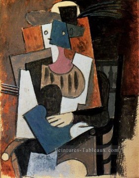  femme - Femme au chapeau un panache assise dans un fauteuil 1919 cubiste Pablo Picasso